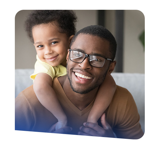 Black man with glasses and his child
